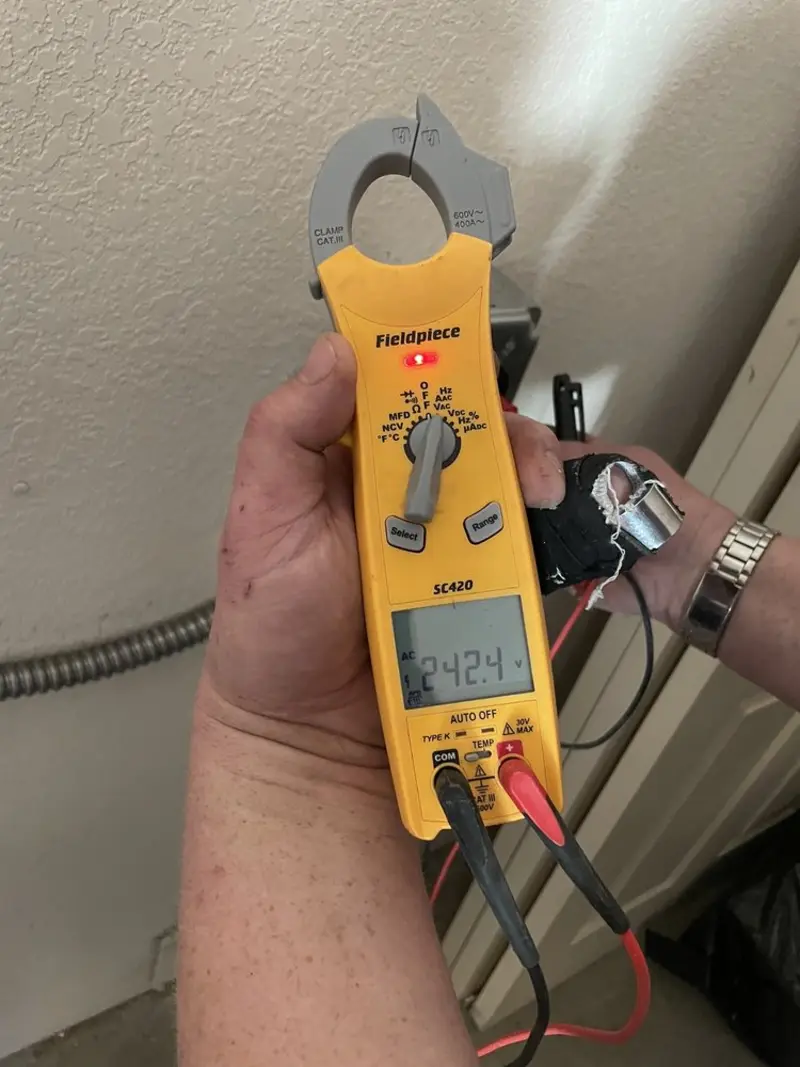 Voltage testing with clamp meter during Outlet Installation in Moncks Corner